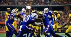 University of Florida safeties Nick Washington and Chauncey Gardner combine on a tackle- Florida Gators football- 1280x854