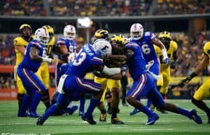 University of Florida safeties Nick Washington and Chauncey Gardner combine on a tackle- Florida Gators football- 1280x854