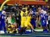 University of Michigan linebacker Devin Bush celebrates after Chase Winovich sacked and forced a fumble on Malik Zaire in the end zone- Florida Gators football- 1280x855