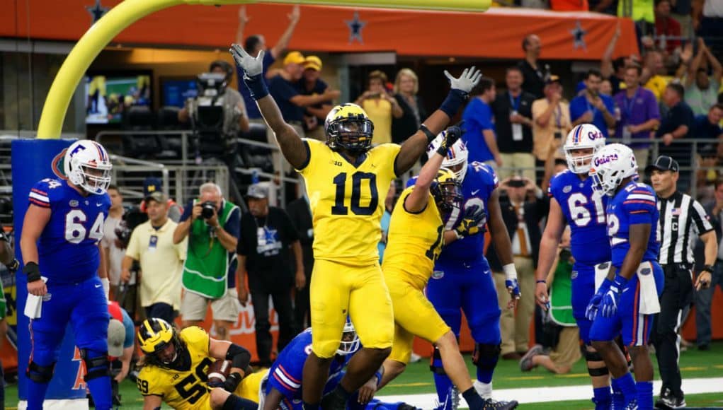 University of Michigan linebacker Devin Bush celebrates after Chase Winovich sacked and forced a fumble on Malik Zaire in the end zone- Florida Gators football- 1280x855