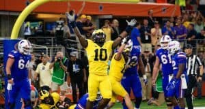 University of Michigan linebacker Devin Bush celebrates after Chase Winovich sacked and forced a fumble on Malik Zaire in the end zone- Florida Gators football- 1280x855