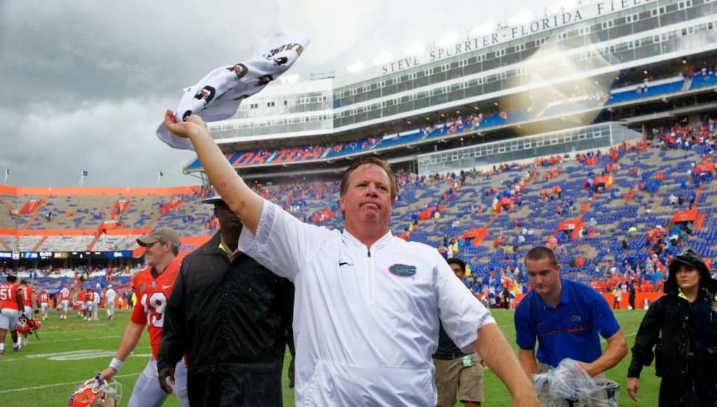 Florida Gators head coach Jim McElwain celebrates after the Vanderbilt game- 1280x854