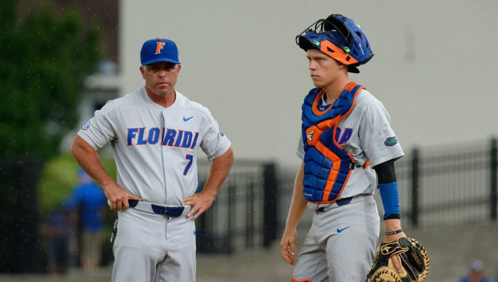 University of Florida head baseball coach Kevin O’Sullivan and catcher JJ Schwarz wait for a new pitcher in a win over Wake Forest- Florida Gators baseball- 1280x852