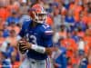 University of Florida quarterback Feleipe Franks rolls out to throw a pass against the LSU Tigers- Florida Gators football- 1280x851