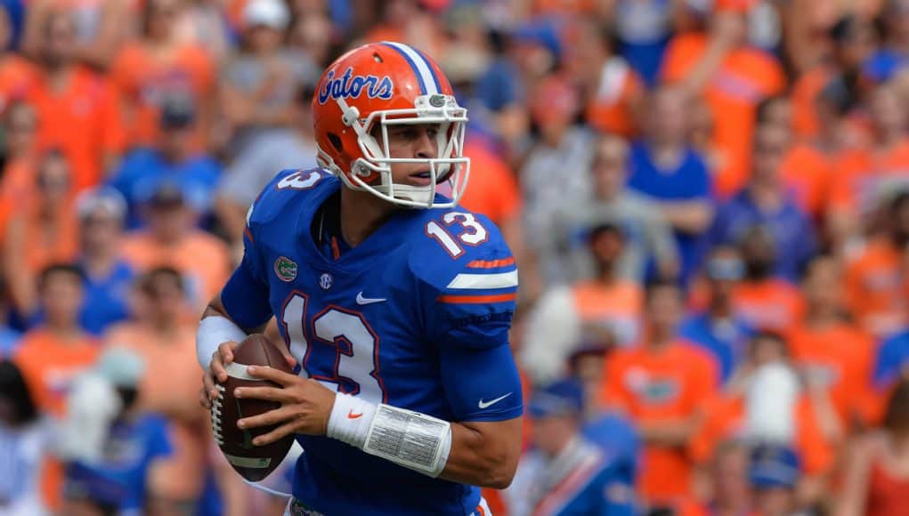 University of Florida quarterback Feleipe Franks rolls out to throw a pass against the LSU Tigers- Florida Gators football- 1280x851