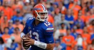 University of Florida quarterback Feleipe Franks rolls out to throw a pass against the LSU Tigers- Florida Gators football- 1280x851