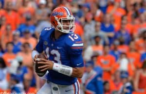 University of Florida quarterback Feleipe Franks rolls out to throw a pass against the LSU Tigers- Florida Gators football- 1280x851