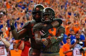 University of Florida receiver Dre Massey and center T.J. McCoy celebrate Massey’s touchdown against Texas A&M- Florida Gators football- 1280x853