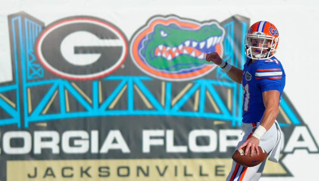 University of Florida receiver Mike McNeely looks back after scoring a touchdown on a fake field goal in a win over the Georgia Bulldogs- Florida Gators football- 1280x852