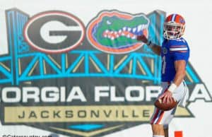 University of Florida receiver Mike McNeely looks back after scoring a touchdown on a fake field goal in a win over the Georgia Bulldogs- Florida Gators football- 1280x852