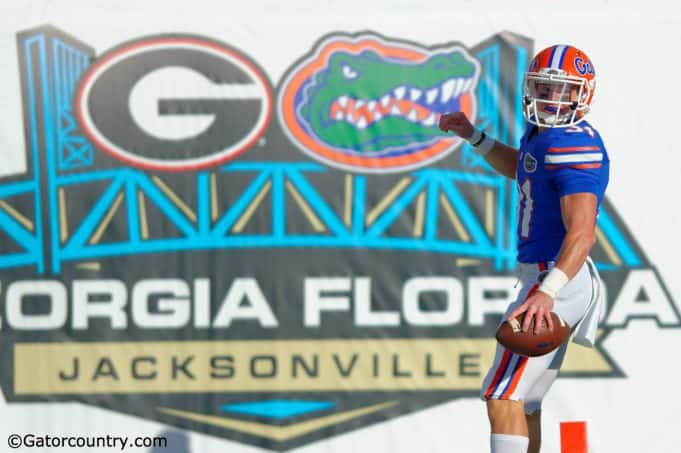 University of Florida receiver Mike McNeely looks back after scoring a touchdown on a fake field goal in a win over the Georgia Bulldogs- Florida Gators football- 1280x852