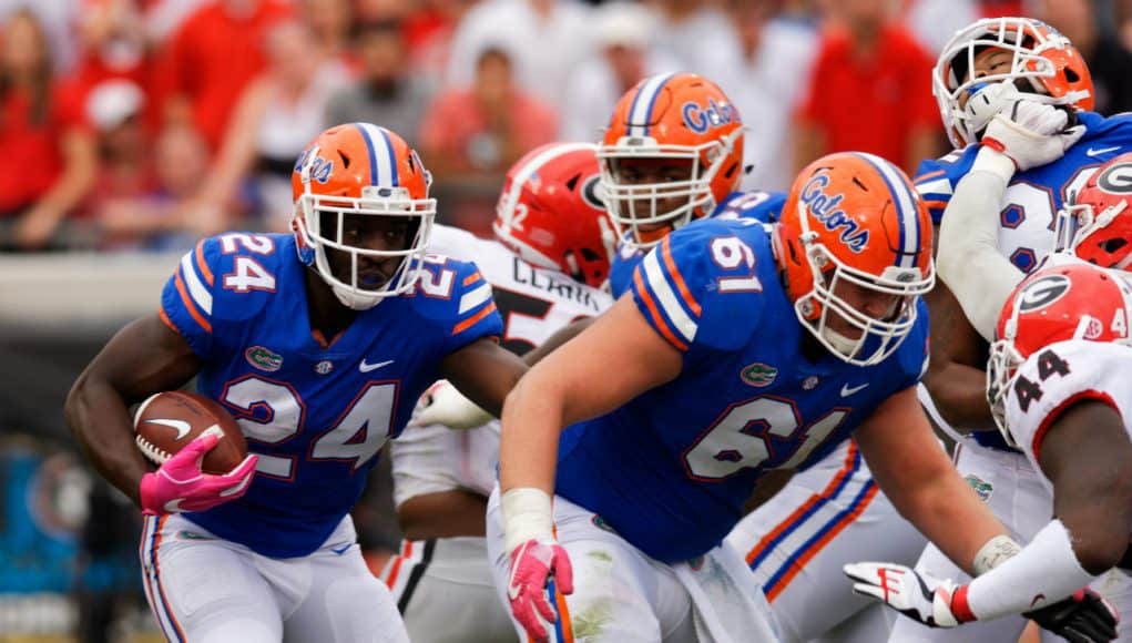 University of Florida running back Mark Thompson carries the ball in a 42-7 loss to the Georgia Bulldogs- Florida Gators football- 1280x853