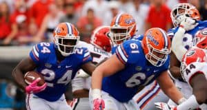 University of Florida running back Mark Thompson carries the ball in a 42-7 loss to the Georgia Bulldogs- Florida Gators football- 1280x853