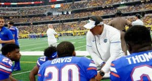 University of Florida running backs coach Ja’Juan Seider coaches his players during the Florida Gators game against the Michigan Wolverines- Florida Gators football- 1280x852