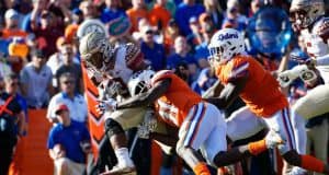 Florida Gators linebacker Vosean Joseph makes a tackle against FSU- 1280x853
