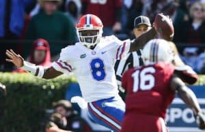 Nov 11, 2017; Columbia, SC, USA; Florida Gators quarterback Malik Zaire (8) scrambles as South Carolina Gamecocks defensive back Rashad Fenton (16) gives chase during the second quarter at Williams-Brice Stadium. Mandatory Credit: Jim Dedmon-USA TODAY Sports