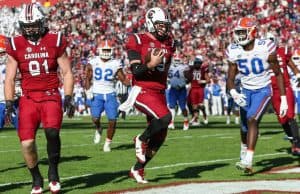 Nov 11, 2017; Columbia, SC, USA; South Carolina Gamecocks quarterback Jake Bentley (19) runs into the end zone to score a touchdown against the Florida Gators during the second half at Williams-Brice Stadium. Mandatory Credit: Jim Dedmon-USA TODAY Sports