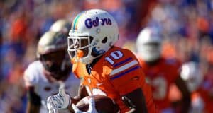 University of Florida receiver Josh Hammond runs after a catch against the Florida State Seminoles- Florida Gators football- 1280x853