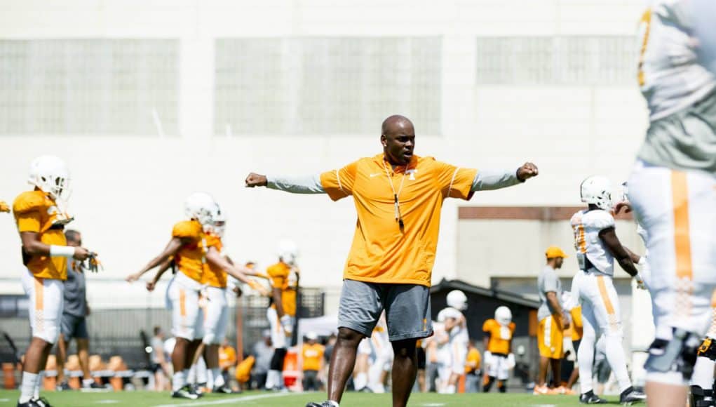 Aug 18, 2017; Knoxville, TN, USA; Tennessee Volunteers defensive backs coach Charlton Warren warms up with players during fall football practice at Anderson Training Facility. Mandatory Credit: Calvin Mattheis/Knoxville News Sentinel via USA TODAY NETWORK