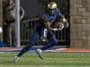 Sep 30, 2016; Las Vegas , NV, USA; St. Thomas Aquinas Raiders wide receiver Trevon Grimes (16) runs with the ball against the Bishop Gorman Gaels during the second quarter at Fertitta Field. Mandatory Credit: Joshua Dahl-USA TODAY Sports