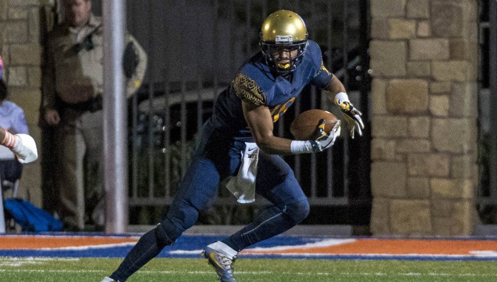 Sep 30, 2016; Las Vegas , NV, USA; St. Thomas Aquinas Raiders wide receiver Trevon Grimes (16) runs with the ball against the Bishop Gorman Gaels during the second quarter at Fertitta Field. Mandatory Credit: Joshua Dahl-USA TODAY Sports