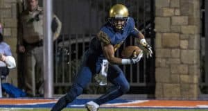 Sep 30, 2016; Las Vegas , NV, USA; St. Thomas Aquinas Raiders wide receiver Trevon Grimes (16) runs with the ball against the Bishop Gorman Gaels during the second quarter at Fertitta Field. Mandatory Credit: Joshua Dahl-USA TODAY Sports