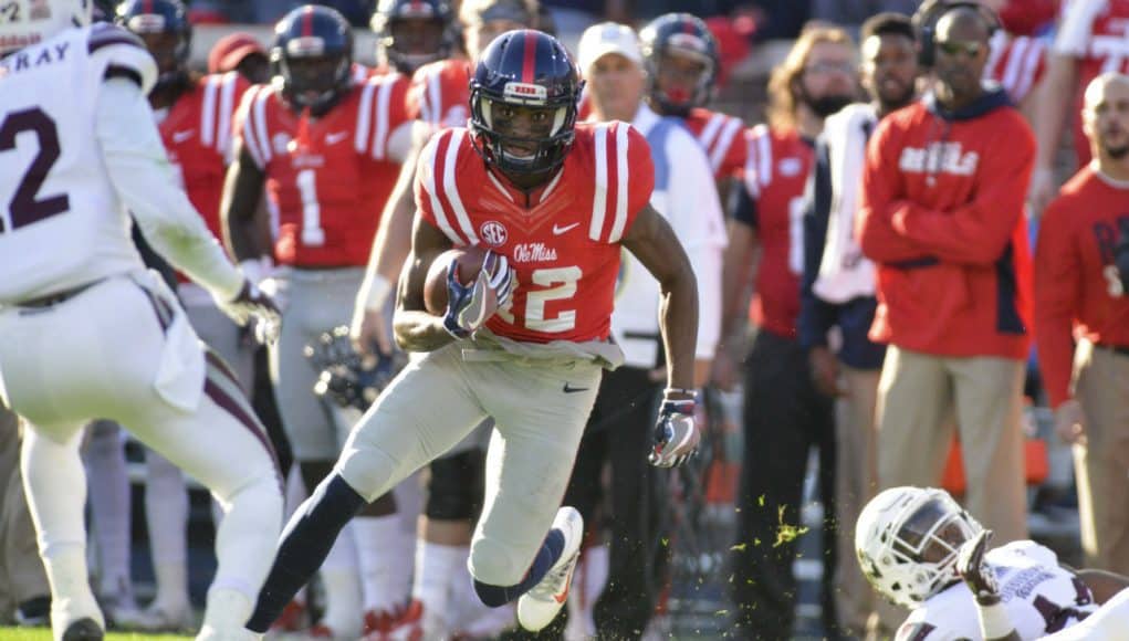 Nov 26, 2016; Oxford, MS, USA; Mississippi Rebels wide receiver Van Jefferson (12) carries the ball during the first quarter of the game against the Mississippi State Bulldogs at Vaught-Hemingway Stadium. Mandatory Credit: Matt Bush-USA TODAY Sports