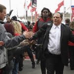 Nov 26, 2016; Louisville, KY, USA; Louisville Cardinals defensive coordinator Todd Grantham greets fans during the Card March before facing the Kentucky Wildcats at Papa John's Cardinal Stadium. Mandatory Credit: Jamie Rhodes-USA TODAY Sports