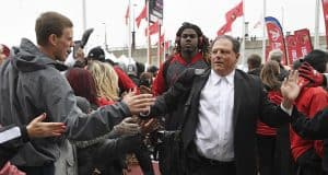 Nov 26, 2016; Louisville, KY, USA; Louisville Cardinals defensive coordinator Todd Grantham greets fans during the Card March before facing the Kentucky Wildcats at Papa John's Cardinal Stadium. Mandatory Credit: Jamie Rhodes-USA TODAY Sports