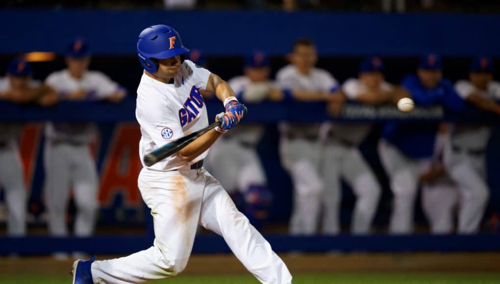 University of Florida outfielder Nick Horvath singles against Siena on opening night of the 2018 baseball season- Florida Gators baseball- 1280x853