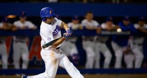 University of Florida outfielder Nick Horvath singles against Siena on opening night of the 2018 baseball season- Florida Gators baseball- 1280x853