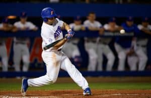 University of Florida outfielder Nick Horvath singles against Siena on opening night of the 2018 baseball season- Florida Gators baseball- 1280x853