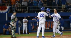 University of Florida third baseman Jonathan India is congratulated by JJ Schwarz after India’s fourth inning home run against Siena- Florida Gators baseball- 1280x853