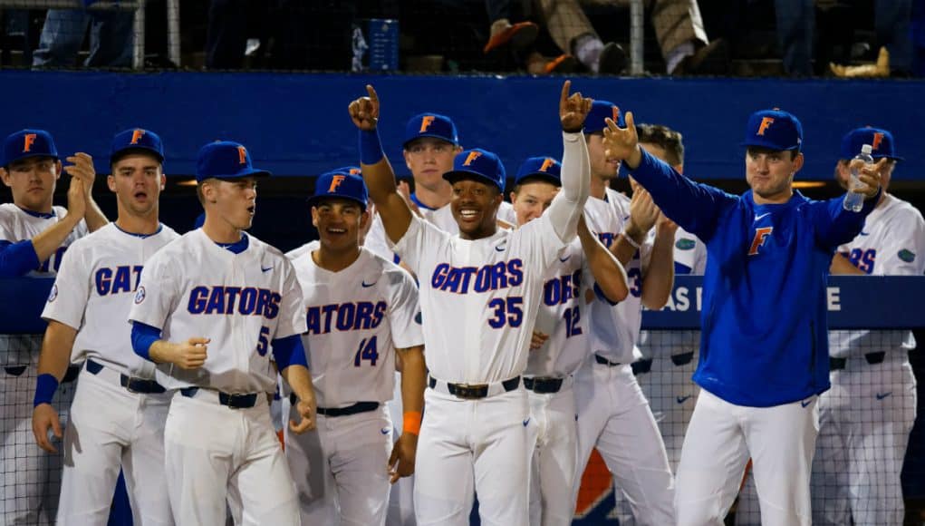 Andrew Baker and the Florida Gators baseball team celebrate a run scored in the season opener against Siena- Florida Gators baseball- 1280x853