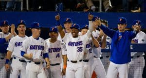 Andrew Baker and the Florida Gators baseball team celebrate a run scored in the season opener against Siena- Florida Gators baseball- 1280x853