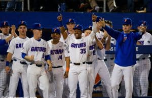 Andrew Baker and the Florida Gators baseball team celebrate a run scored in the season opener against Siena- Florida Gators baseball- 1280x853