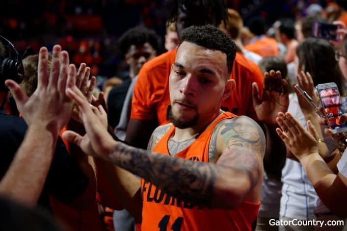 Florida Gators guard Chris Chiozza celebrates after beating Kentucky for senior day-1280x852