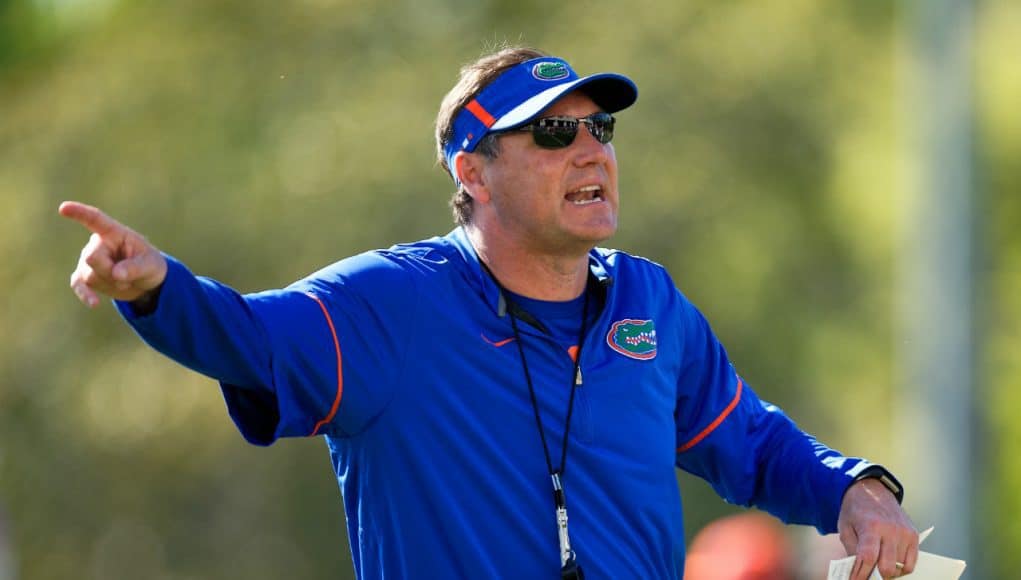 Florida Gators head coach Dan Mullen gives instructions to the quarterbacks- 1280x853