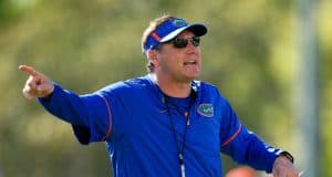 Florida Gators head coach Dan Mullen gives instructions to the quarterbacks- 1280x853