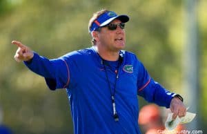 Florida Gators head coach Dan Mullen gives instructions to the quarterbacks- 1280x853