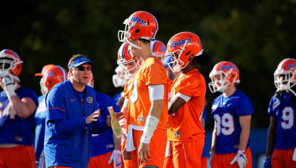 Florida Gators head coach Dan Mullen talks to the quarterbacks- 1280x853