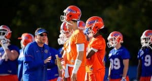 Florida Gators head coach Dan Mullen talks to the quarterbacks- 1280x853