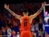 Florida Gators point guard Chris Chiozza recognizes the crowd as he walks off the court during senior day- Florida Gators basketball- 1280x853