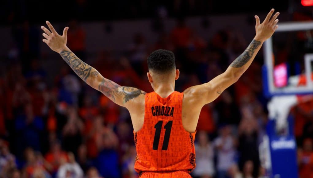 Florida Gators point guard Chris Chiozza recognizes the crowd as he walks off the court during senior day- Florida Gators basketball- 1280x853