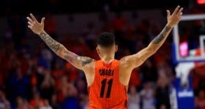 Florida Gators point guard Chris Chiozza recognizes the crowd as he walks off the court during senior day- Florida Gators basketball- 1280x853