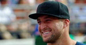 Former University of Florida quarterback Tim Tebow on the sideline for the Florida Gators matchup against the Georgia Bulldogs- Florida Gators football-1280x852