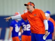 University of Florida head football coach Dan Mullen yells instructions while his football team stretches before football practice begins- Florida Gators baseball- 1280x853