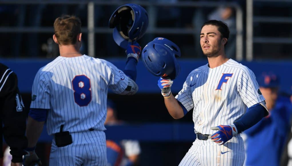 University of Florida infielder Jonathan India celebrates with Deacon Liput after a solo home run in the second inning against FSU- Florida Gators baseball- 1280x853
