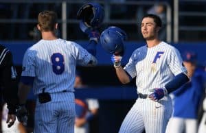 University of Florida infielder Jonathan India celebrates with Deacon Liput after a solo home run in the second inning against FSU- Florida Gators baseball- 1280x853