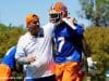 University of Florida receivers coach Billy Gonzales walks with his arm around Kadarius Toney during spring football camp- Florida Gators football- 1280x853